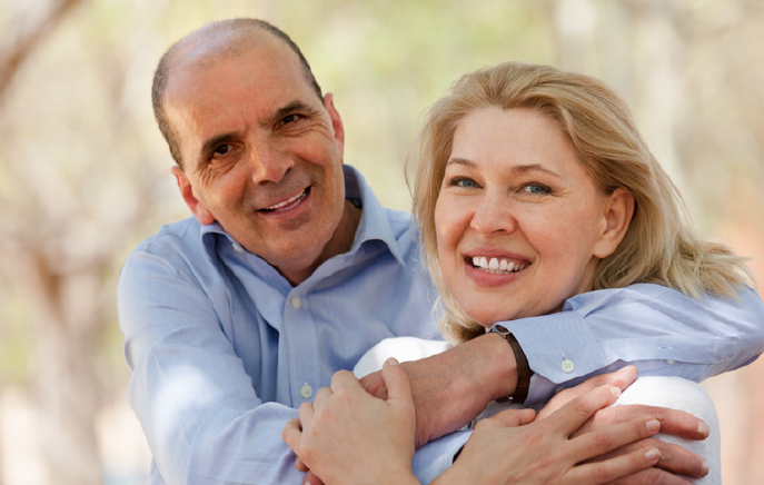 Man hugging a woman